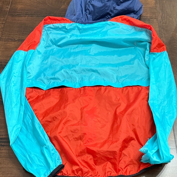 Cotopaxi Kids Raincoat - Red, Blue, and Yellow - Picture 3 of 3